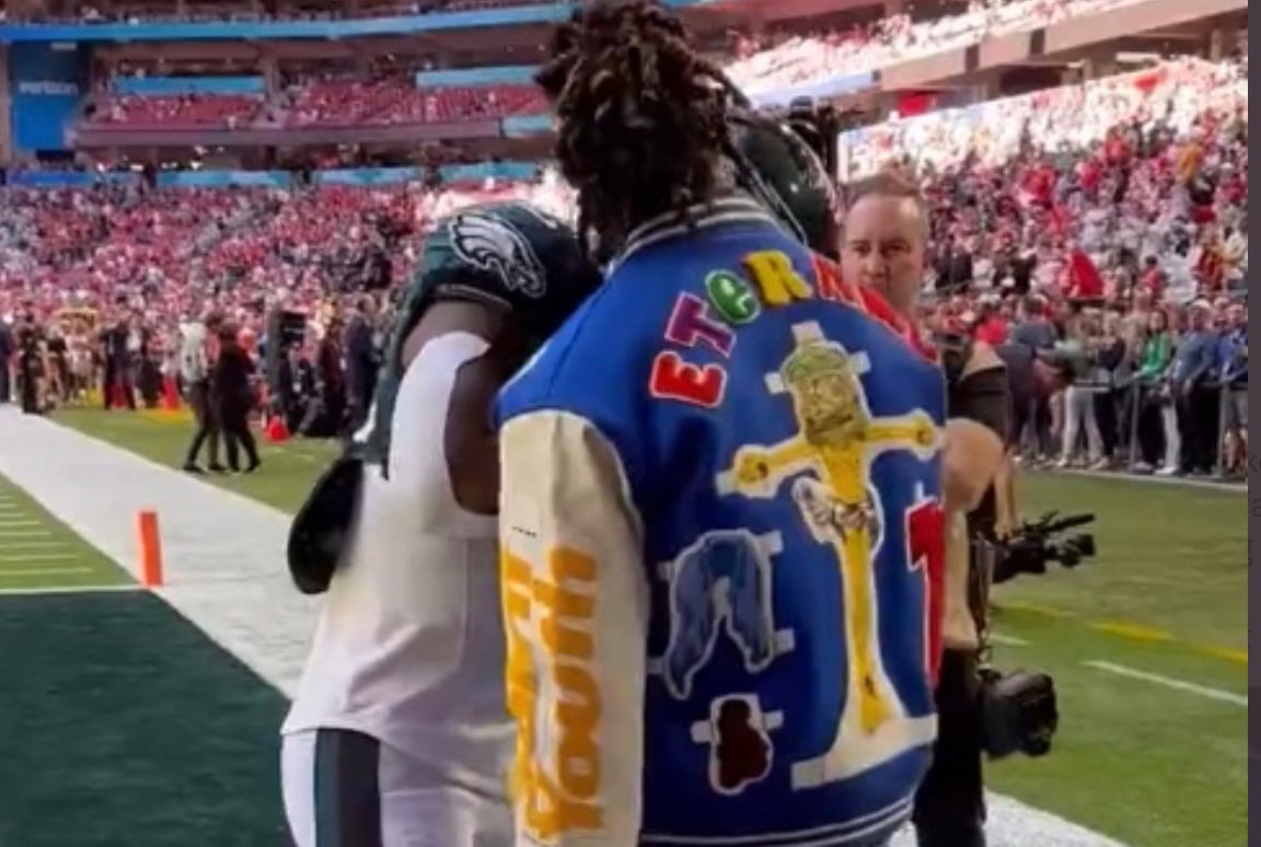 Adrian Peterson Responds to Damar Hamlin’s “Blasphemy” Jacket Seen at Super Bowl