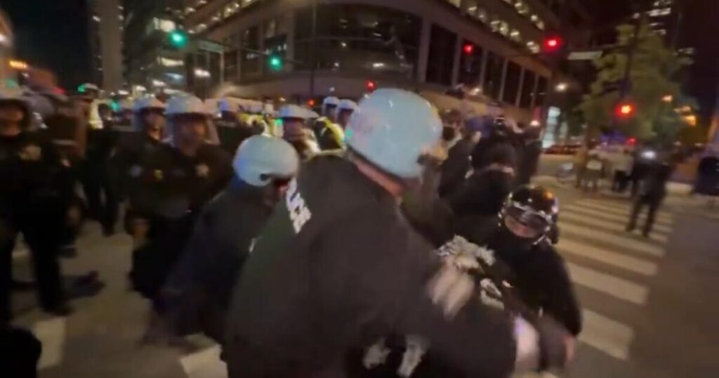 Chicago Police Manhandle Antifa as Far-Left Protesters Burn American Flag on Second Night of DNC Convention (VIDEO)