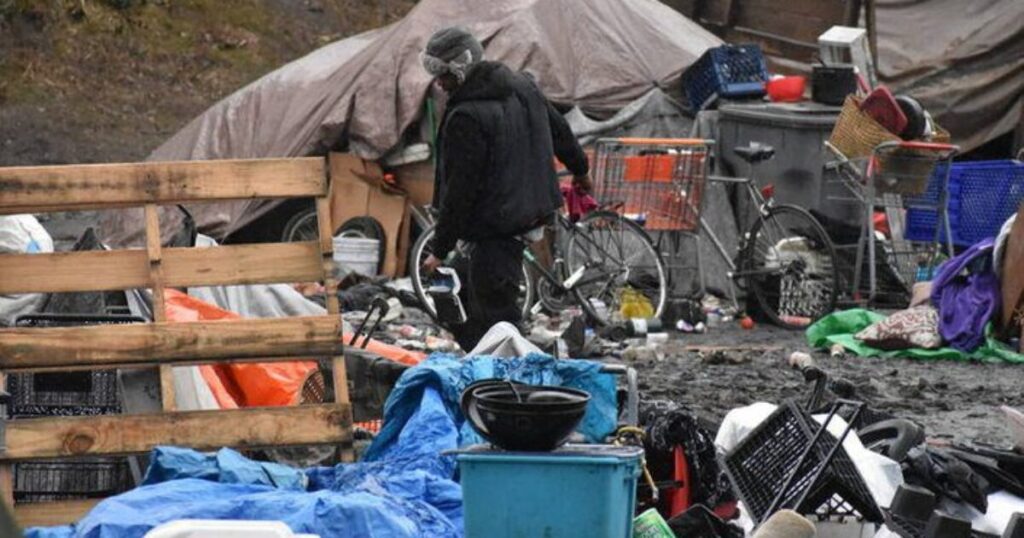 Volunteers Cleaning Homeless Encampment in Seattle Discover Nearly 80 Potentially Explosive Propane Tanks