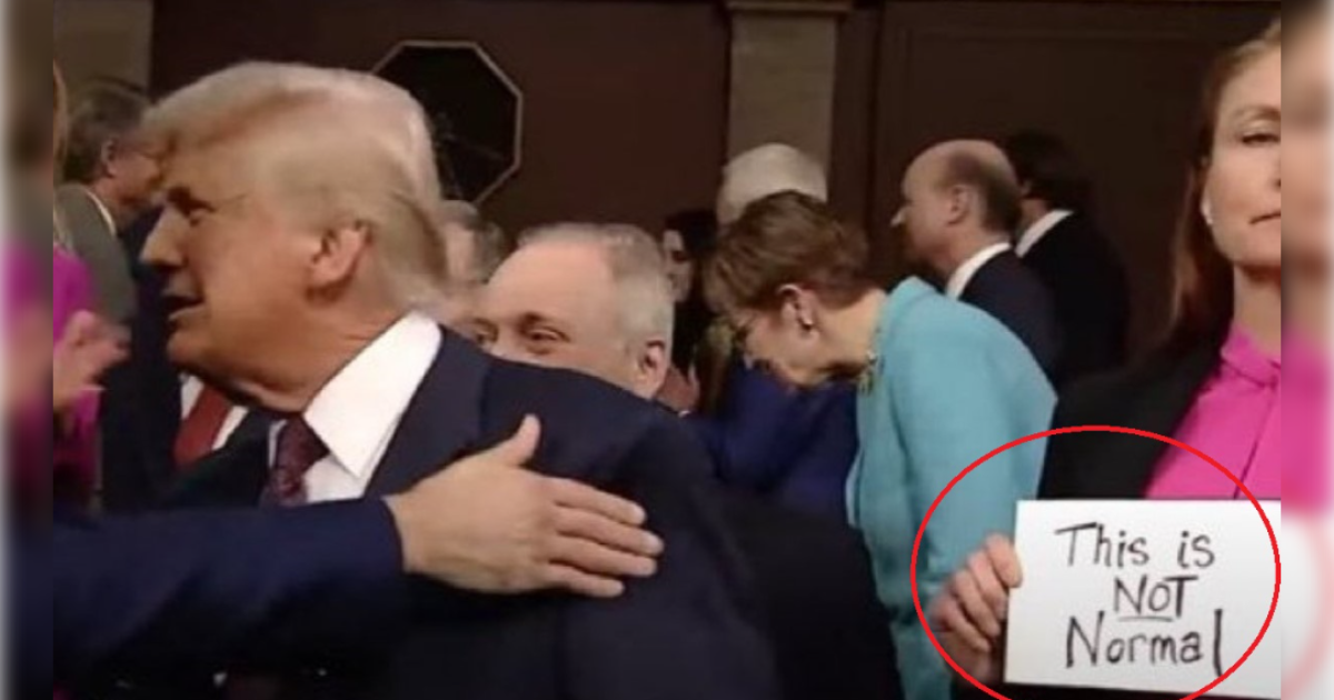 Democrat Flashes “This Is Not Normal” Sign When Trump Walks Into Chamber – Republican Lawmaker Takes it and Flings It into Air (VIDEO)