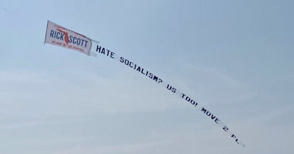 Sen. Scott Flies Banner Over NYC Beaches Urging Anti-Socialist New Yorkers to Flee to Florida if Zohran Mamdani Wins Mayoral Race (VIDEO)